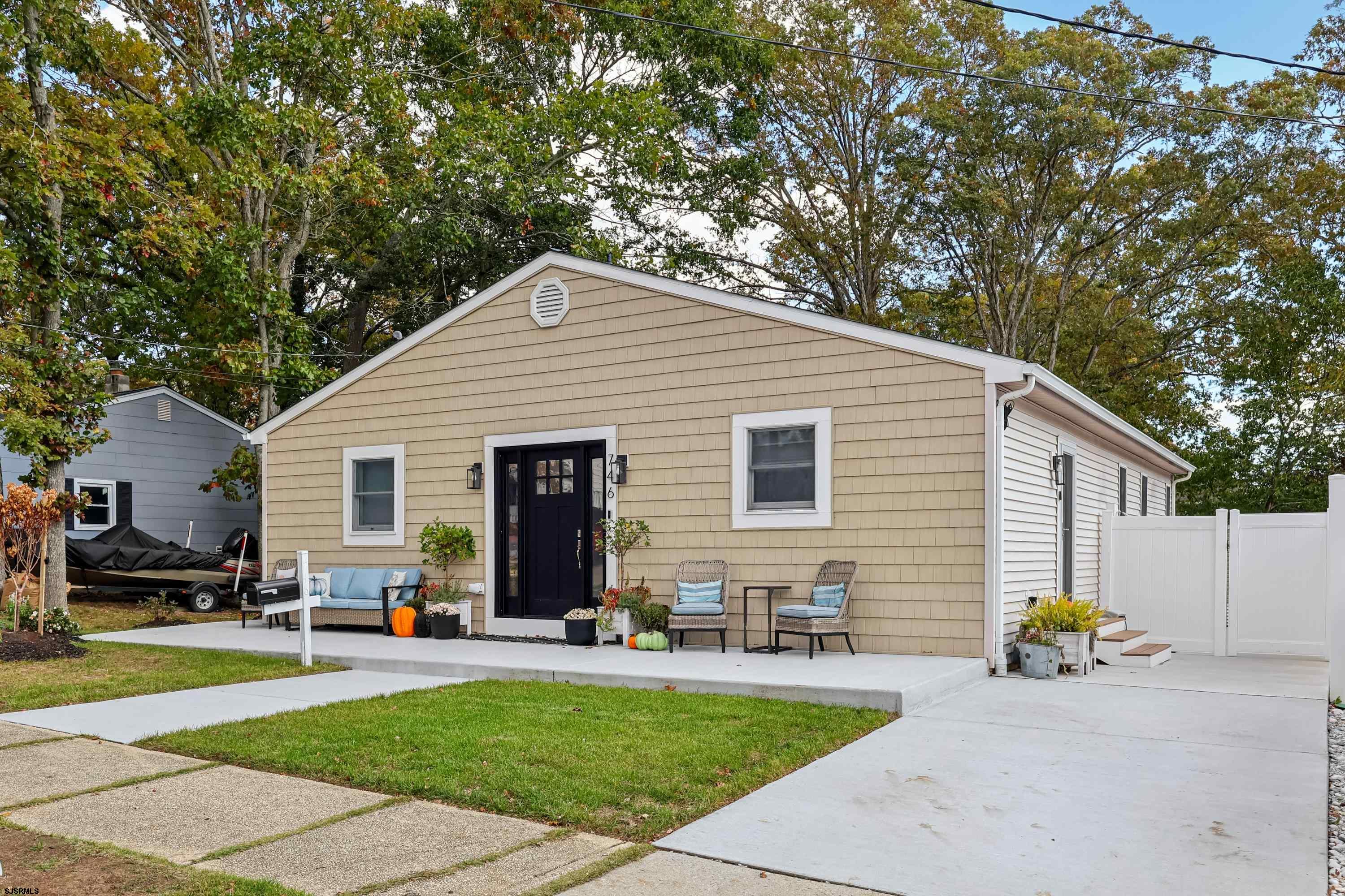 746 4th Street Somers Point, NJ 08244 - Photo 4 of 39 a view of a backyard with sitting area