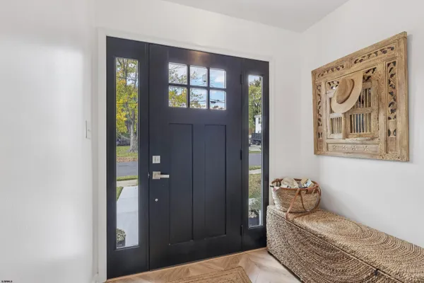 a bedroom with a bed and hallway