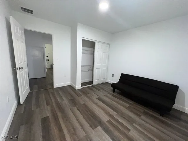 a bathroom with a toilet a sink and bathtub