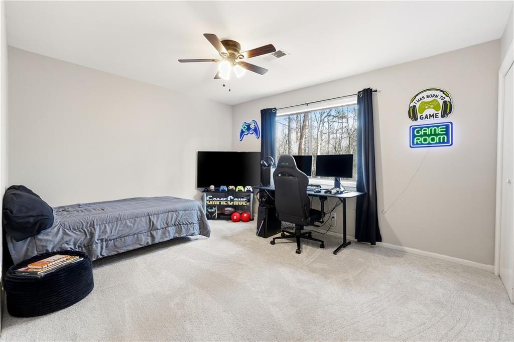 1720 Little Willeo Road Marietta, GA 30068 - Photo 19 of 26 a view of a livingroom with workspace and a window
