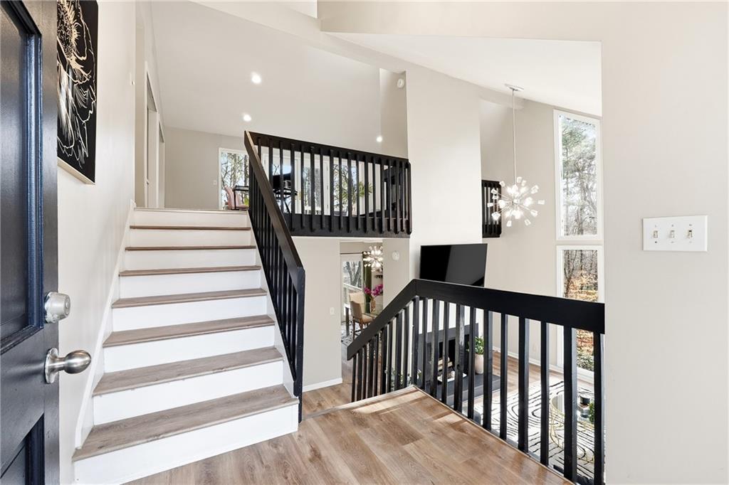 1720 Little Willeo Road Marietta, GA 30068 - Photo 2 of 26 a view of a staircase with wooden floor and stairs