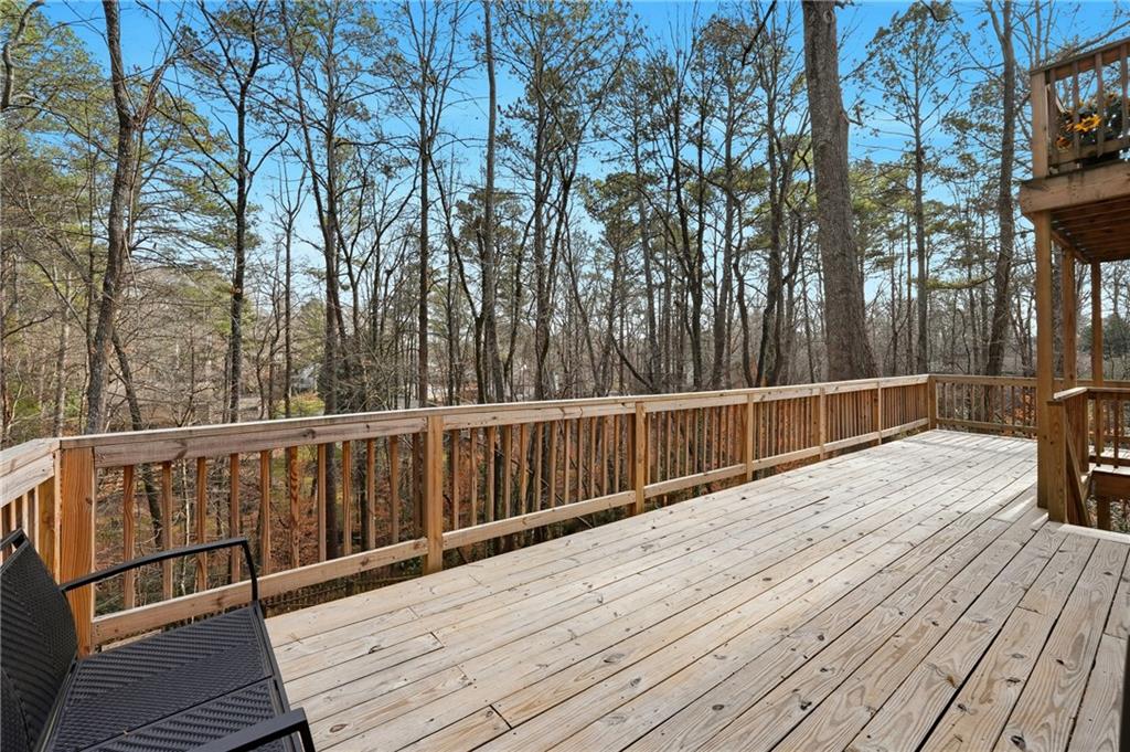 1720 Little Willeo Road Marietta, GA 30068 - Photo 22 of 26 a view of balcony with wooden floor and fence