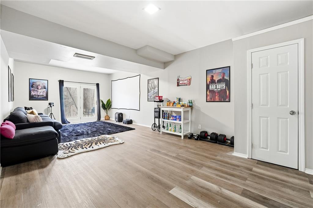 1720 Little Willeo Road Marietta, GA 30068 - Photo 23 of 26 a living room with furniture and a window