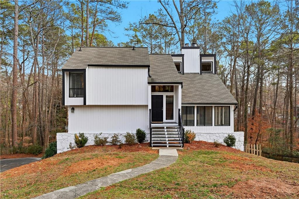 1720 Little Willeo Road Marietta, GA 30068 - Photo 24 of 26 a view of a house with a patio