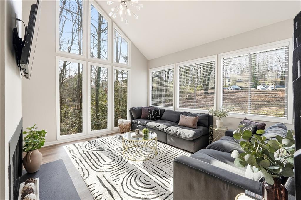 1720 Little Willeo Road Marietta, GA 30068 - Photo 4 of 26 a living room with furniture and a large window