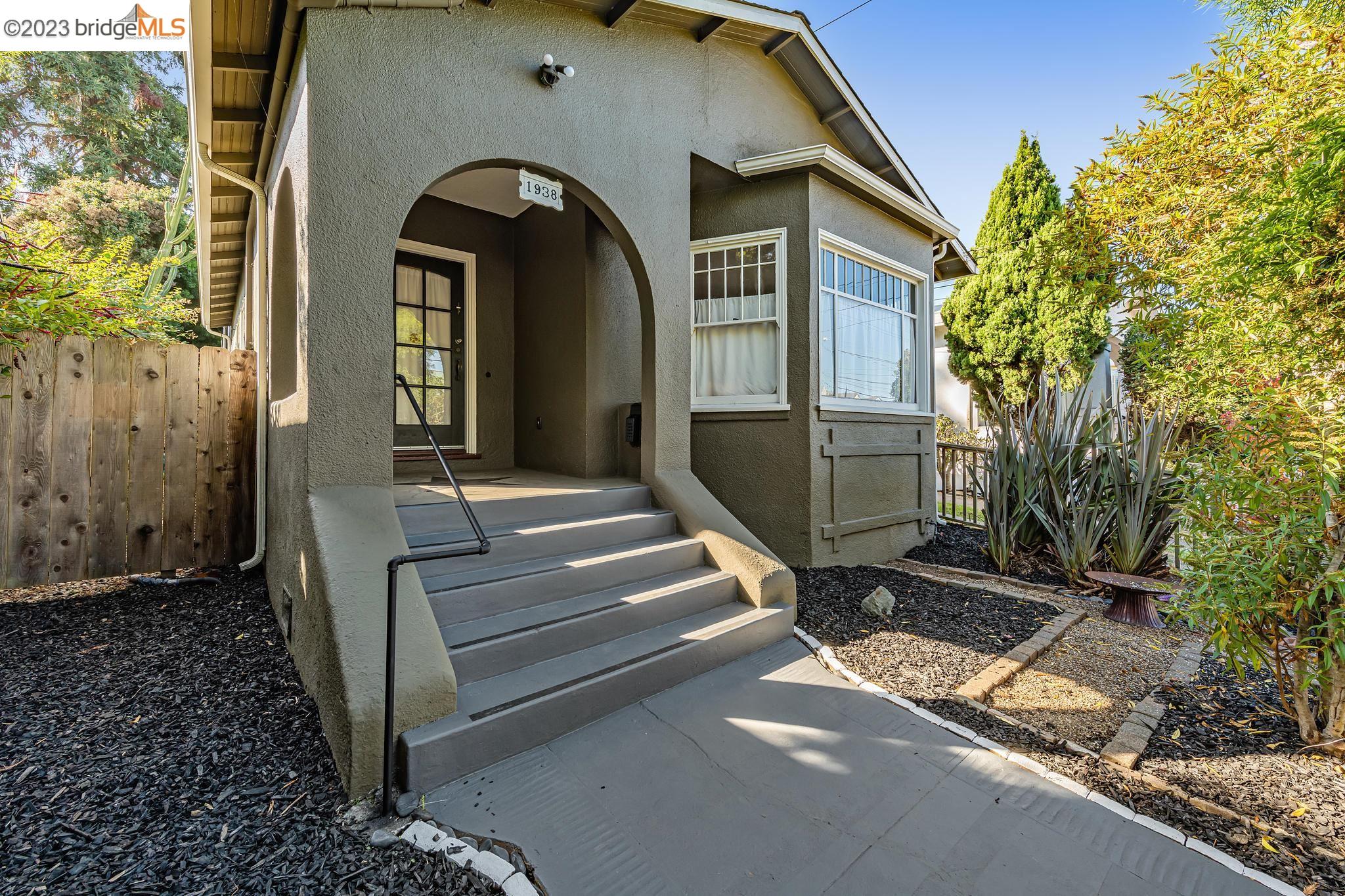 1938 Ward Street Berkeley, CA 94703 - Photo 1 of 1 a front view of a house with a yard