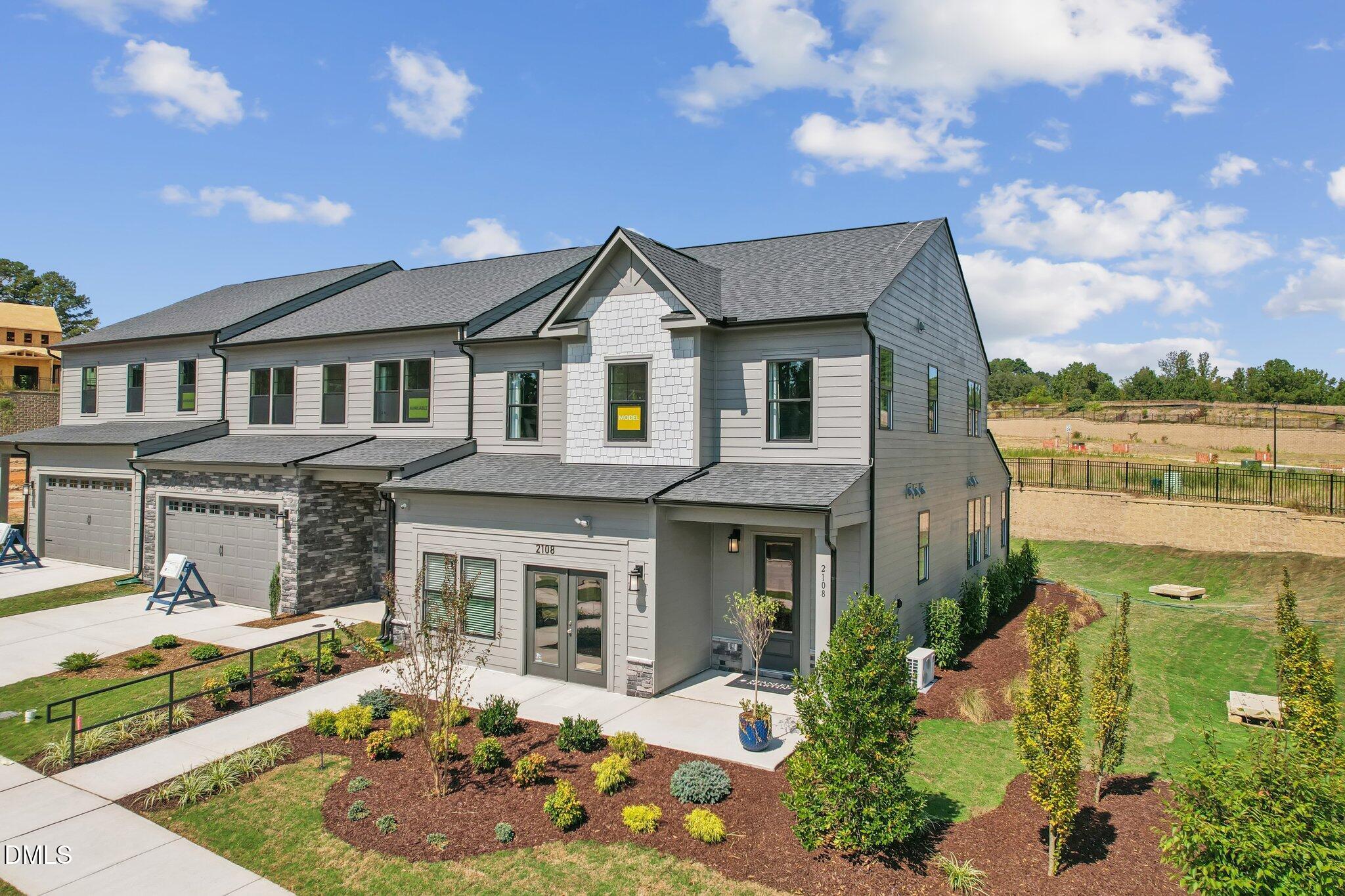 2120 Barrier Ridge Way Apex, NC 27502 - Photo 1 of 43 front view of a house with a yard