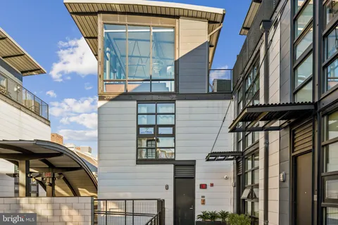a view of a house with a door and deck