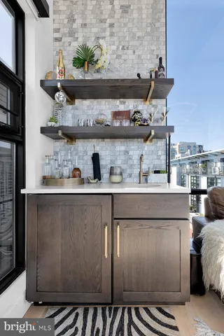 a kitchen with a stove and cabinets