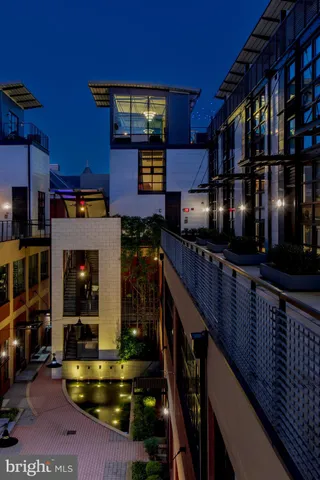 a picture of a brick building with many windows