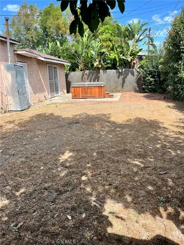 a view of a yard with an outdoor space