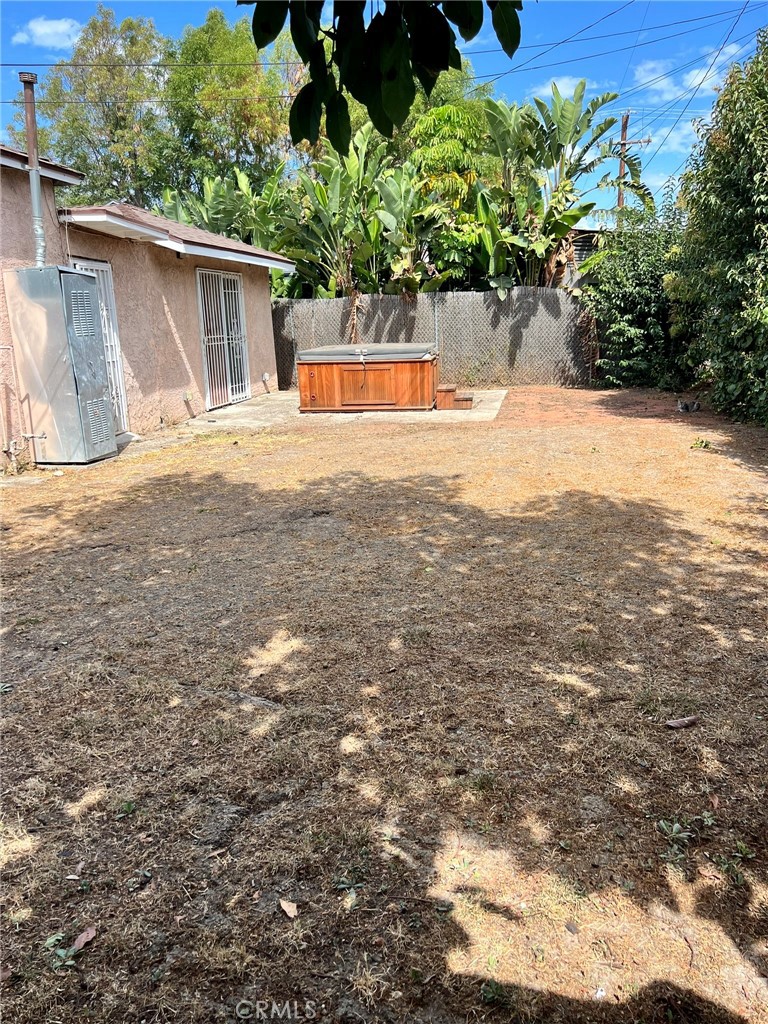 1306 South Cliveden Avenue Compton, CA 90220 - Photo 4 of 19 a view of a yard with an outdoor space
