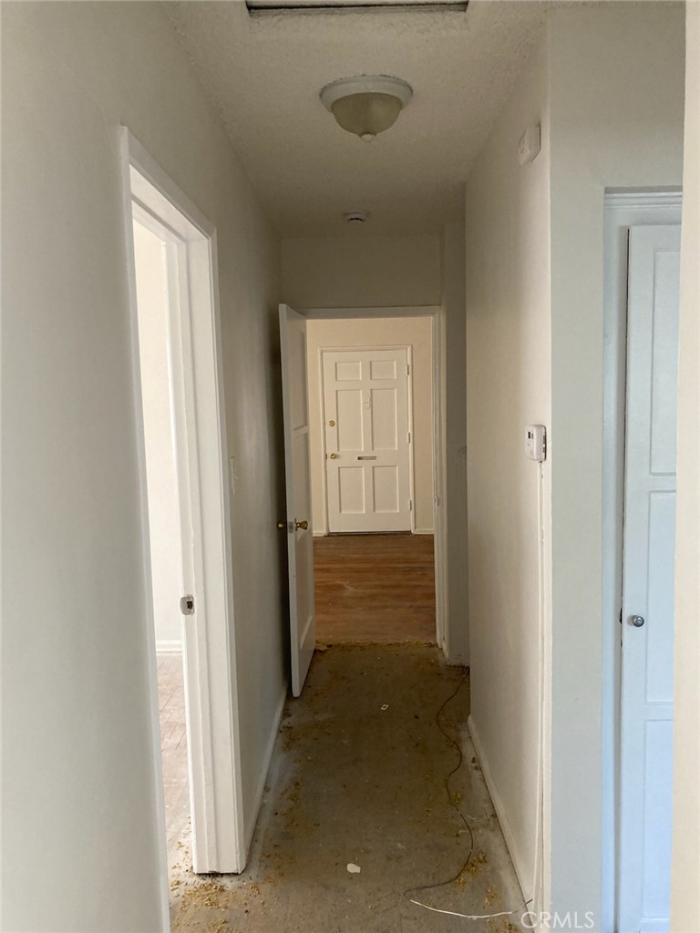 1306 South Cliveden Avenue Compton, CA 90220 - Photo 9 of 19 a view of entryway with wooden floor