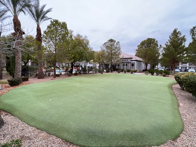 7255 West Sunset Road, Unit 1124 Las Vegas, NV 89113 - Photo 18 of 18 Lush landscaping surrounds this professional putting green situated near the community pool.