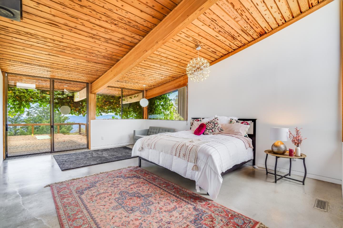 18518 Favre Ridge Road Los Gatos, CA 95033 - Photo 12 of 46 a bed sitting in a bedroom next to a window