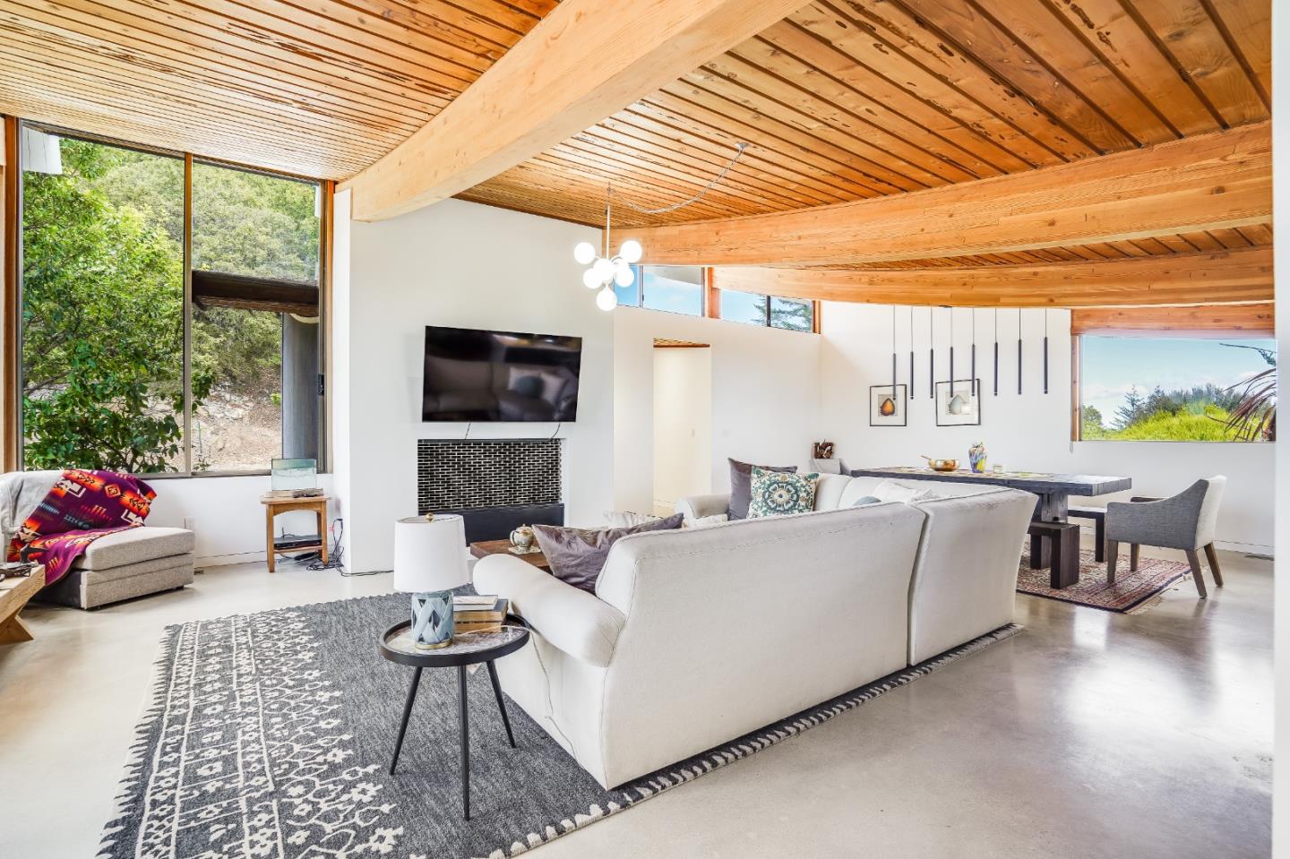 18518 Favre Ridge Road Los Gatos, CA 95033 - Photo 19 of 46 a living room with furniture and a flat screen tv