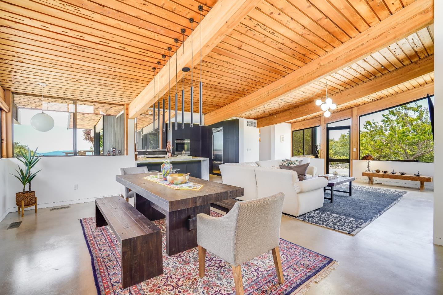 18518 Favre Ridge Road Los Gatos, CA 95033 - Photo 23 of 46 a living room with furniture a table and a large window