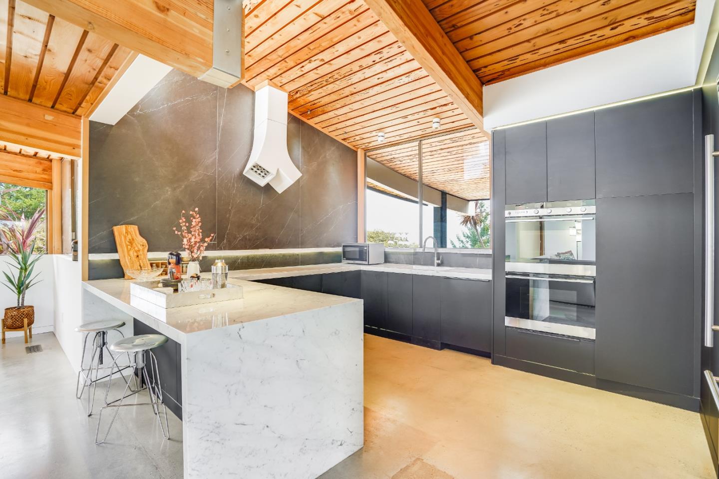 18518 Favre Ridge Road Los Gatos, CA 95033 - Photo 25 of 46 a kitchen with stainless steel appliances kitchen island a sink and a stove