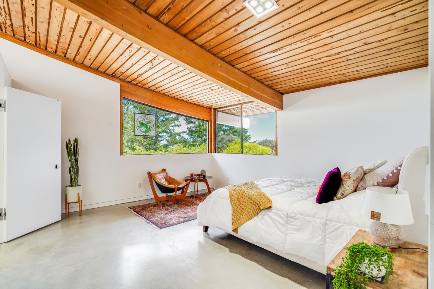 18518 Favre Ridge Road Los Gatos, CA 95033 - Photo 28 of 46 a bedroom with a bed and a window