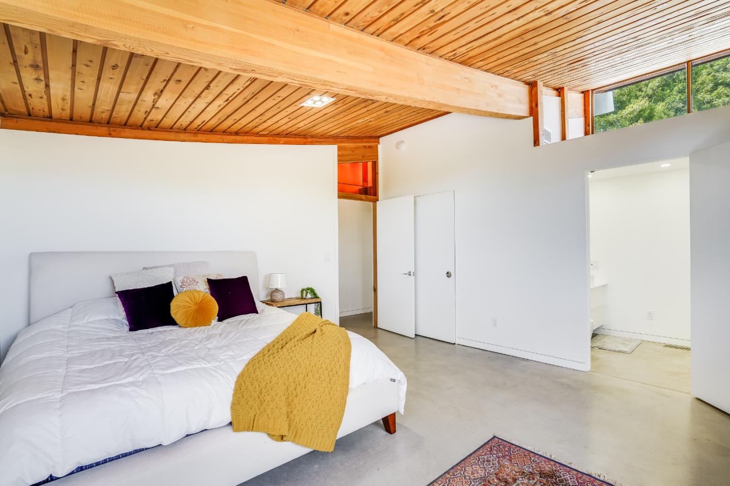 18518 Favre Ridge Road Los Gatos, CA 95033 - Photo 29 of 46 a bedroom with a bed and wooden floor