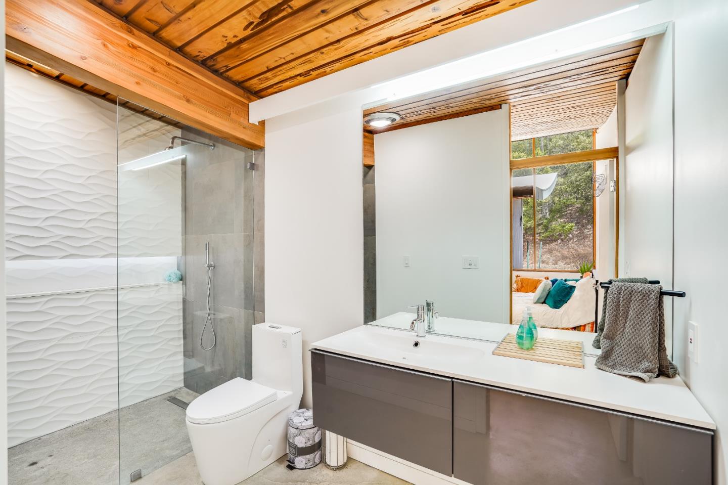 18518 Favre Ridge Road Los Gatos, CA 95033 - Photo 34 of 46 a bathroom with a double vanity sink toilet and shower