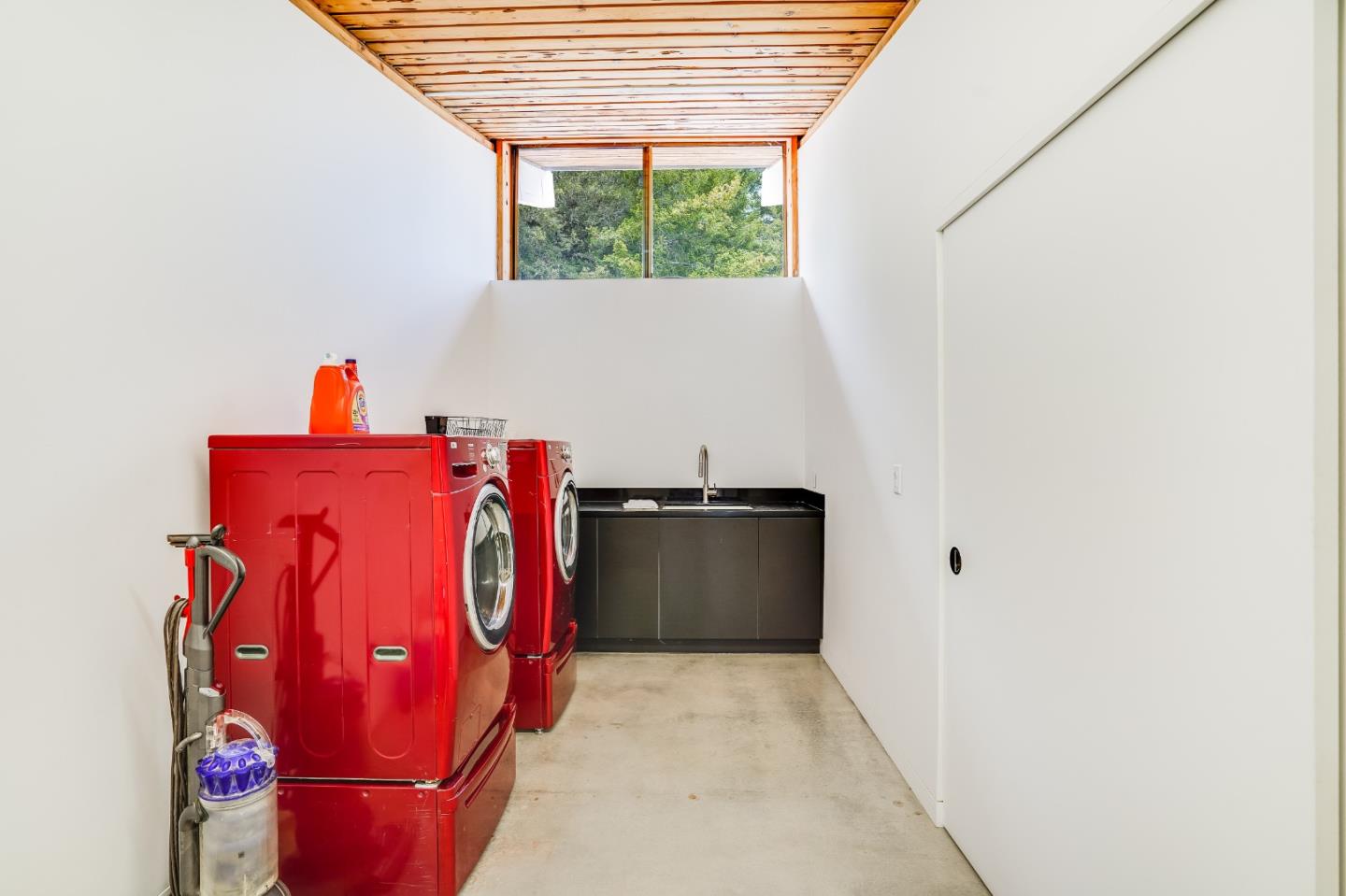 18518 Favre Ridge Road Los Gatos, CA 95033 - Photo 38 of 46 a utility room with dryer and washer