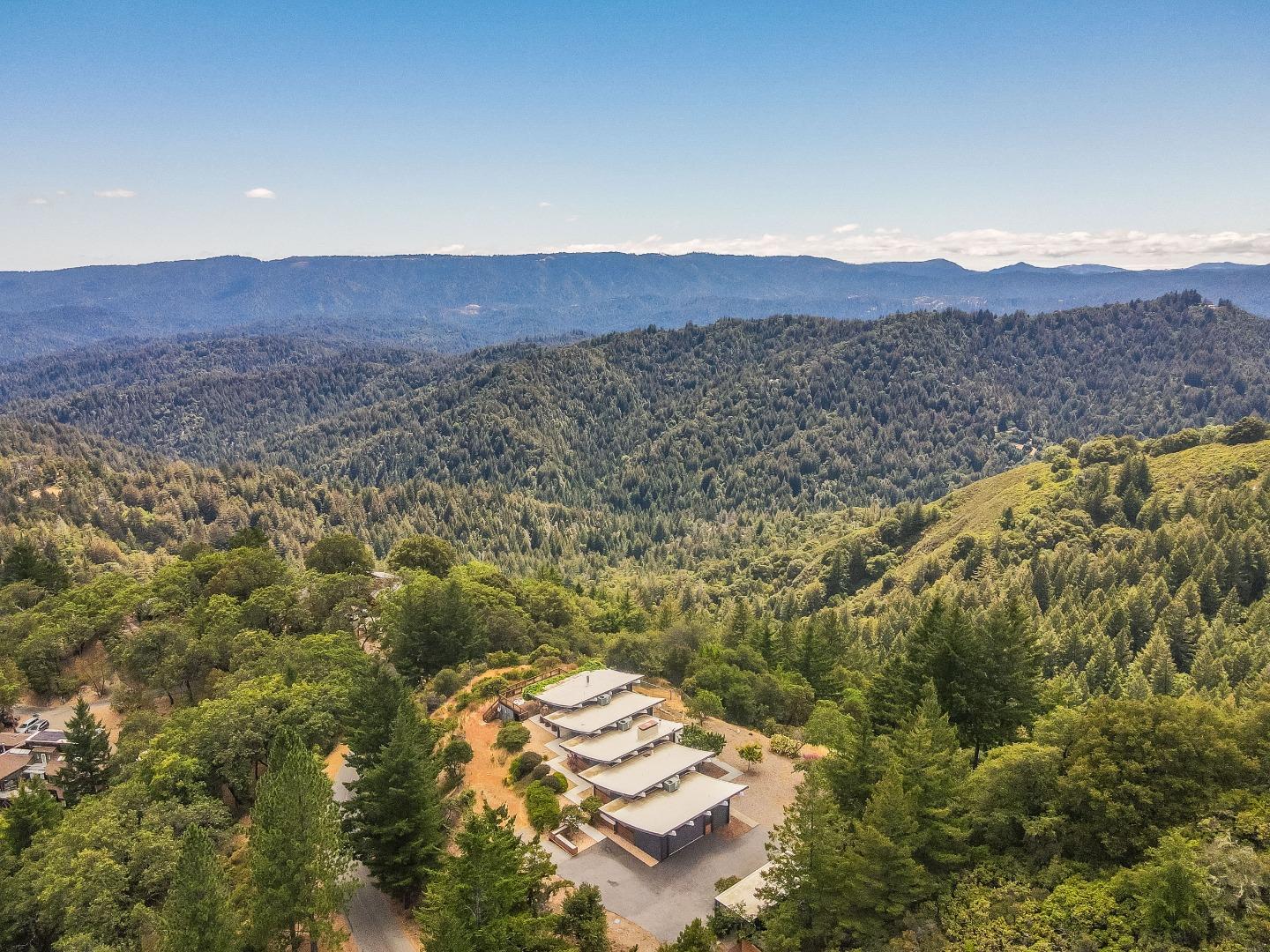 18518 Favre Ridge Road Los Gatos, CA 95033 - Photo 46 of 46 a view of a lush green field with mountains in the background