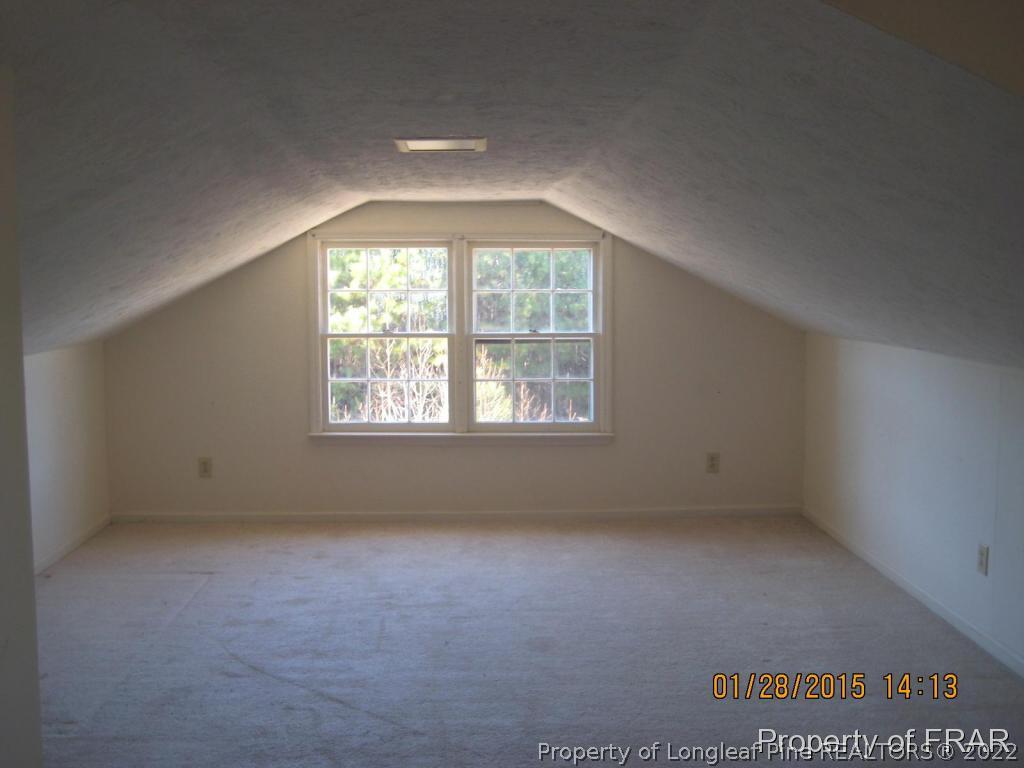 6904 Clinton Road Stedman, NC 28391 - Photo 5 of 6 an empty room with a window