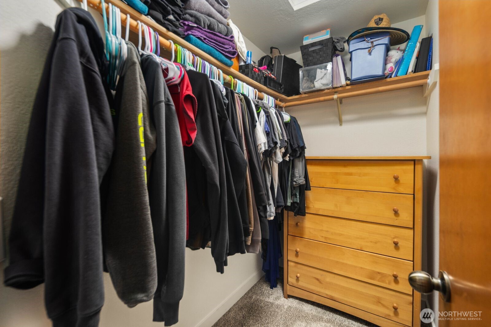 26121 193rd Place Southeast Covington, WA 98042 - Photo 13 of 21 a view of walk in closet with clothes and shoes