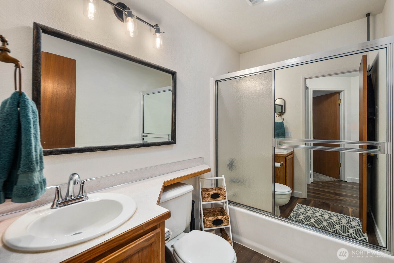 26121 193rd Place Southeast Covington, WA 98042 - Photo 16 of 21 a bathroom with a sink toilet and shower