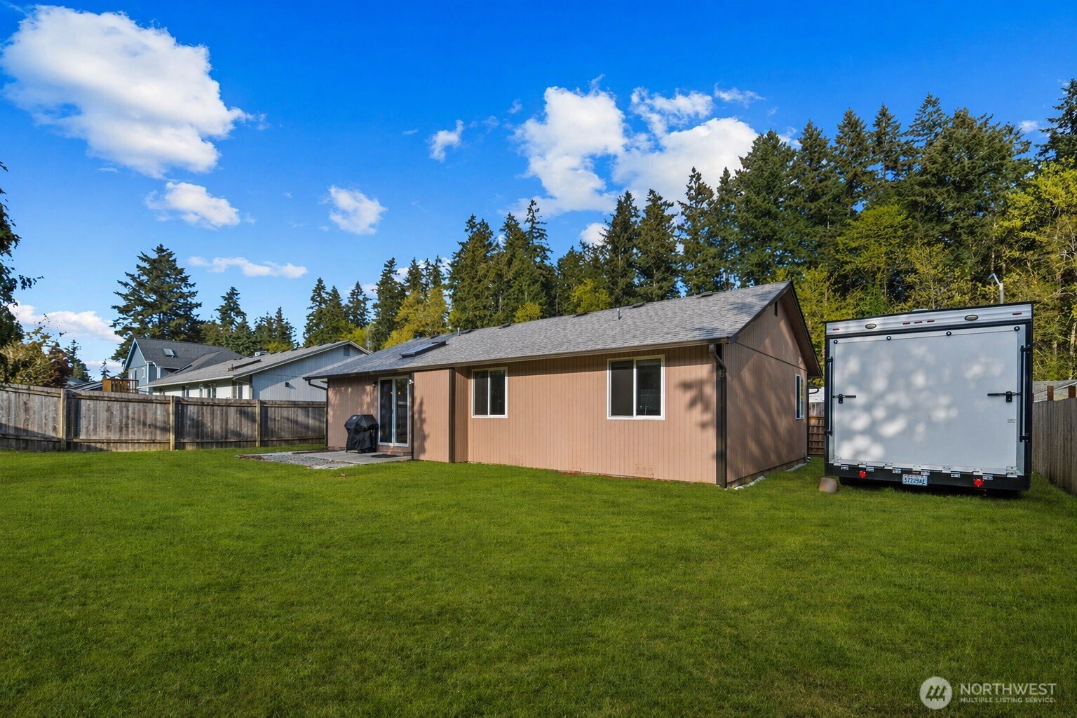 26121 193rd Place Southeast Covington, WA 98042 - Photo 18 of 21 a view of a house with a yard
