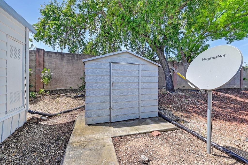 163 Rimma Way Roseville, CA 95661 - Photo 31 of 36 Shed stays, very big yard, other-side is fenced