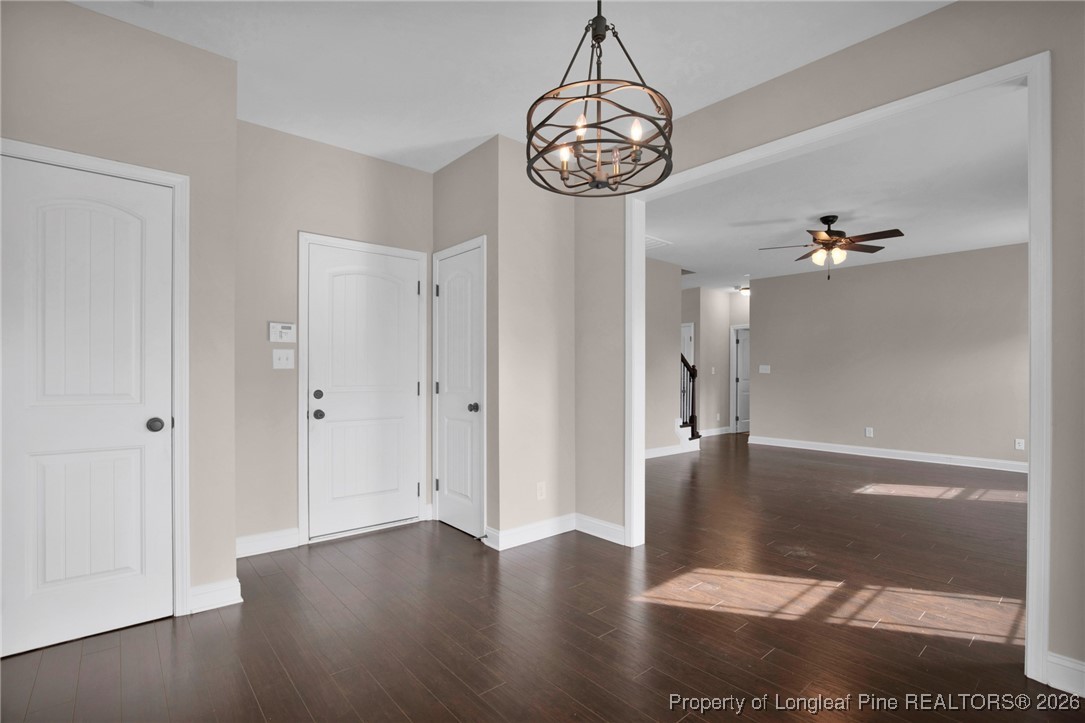 171 Tellmont Street Raeford, NC 28376 - Photo 19 of 46 a view of a hallway with wooden floor