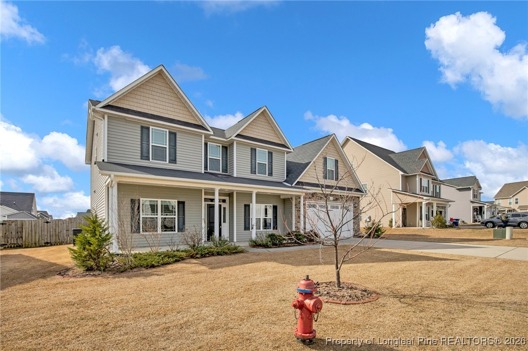 171 Tellmont Street Raeford, NC 28376 - Photo 2 of 46 a front view of a house with a yard