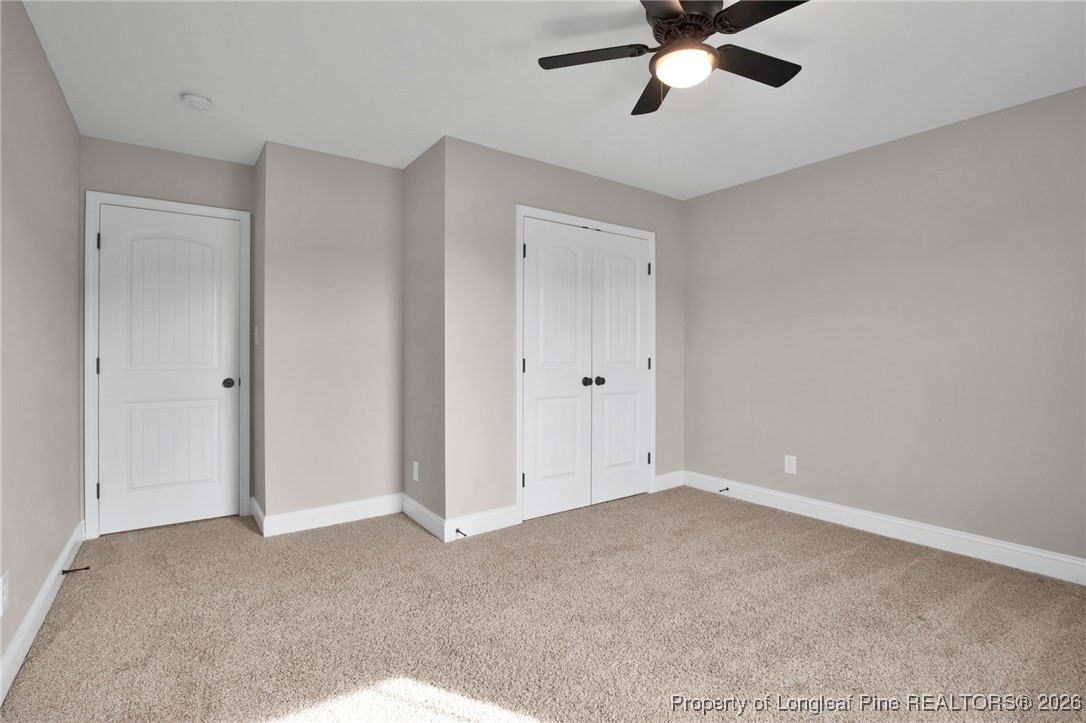 171 Tellmont Street Raeford, NC 28376 - Photo 36 of 46 a view of an empty room and chandelier fan