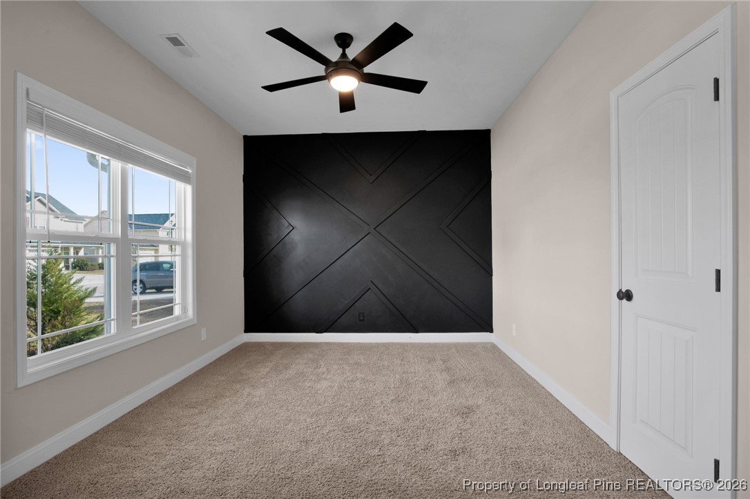 171 Tellmont Street Raeford, NC 28376 - Photo 8 of 46 a view of an empty room with a window