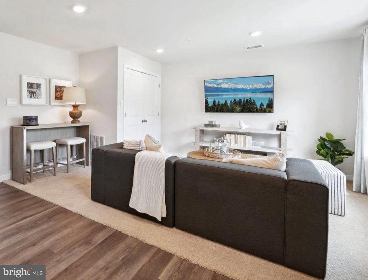 29 Clementon Road East Gibbsboro, NJ 08026 - Photo 11 of 38 a living room with furniture and a flat screen tv