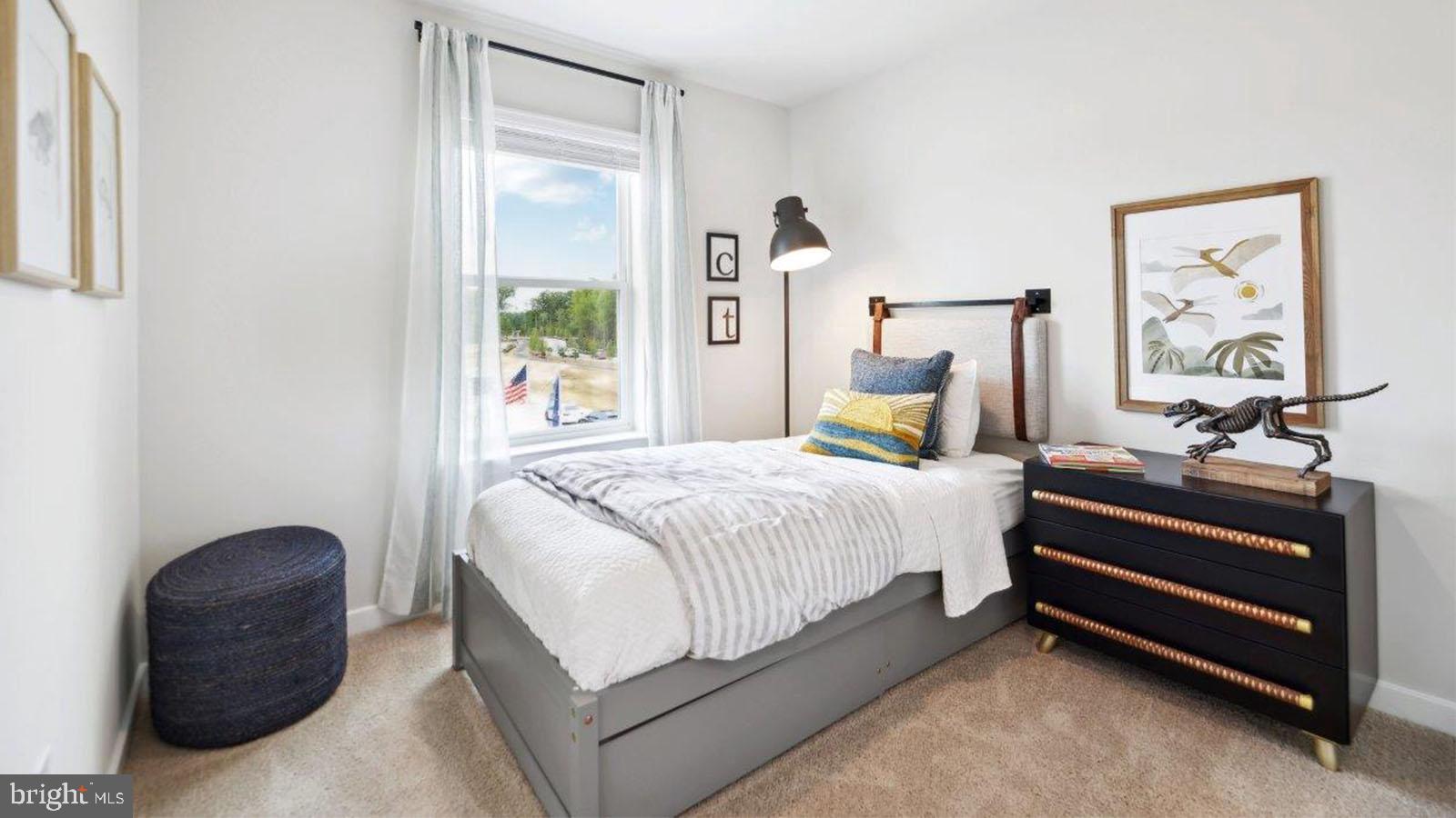 29 Clementon Road East Gibbsboro, NJ 08026 - Photo 34 of 38 a bedroom with a bed and a painting on the wall