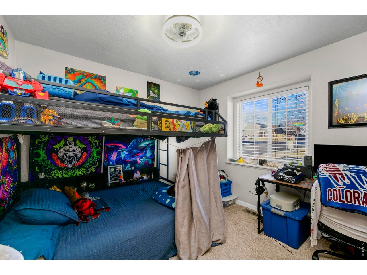 5225 West 11th Street Road Greeley, CO 80634 - Photo 10 of 17 a living room with furniture and a window