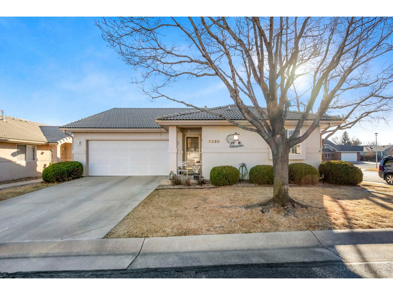 5225 West 11th Street Road Greeley, CO 80634 - Photo 2 of 17 a front view of a house with a yard