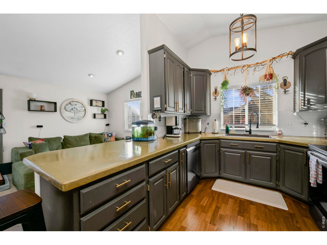 5225 West 11th Street Road Greeley, CO 80634 - Photo 6 of 17 a kitchen with stainless steel appliances granite countertop a sink and cabinets