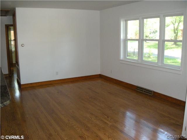 6547 Ludwig Road Richmond, VA 23225 - Photo 6 of 12 Living Room - Large, new replacement windows, lots