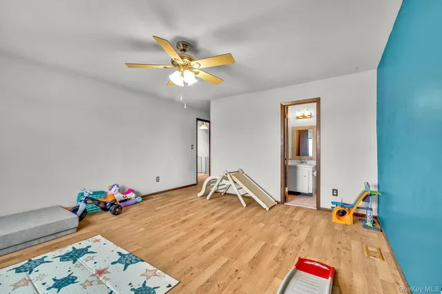 a bathroom with a sink toilet and vanity