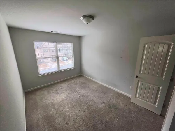 an empty room with windows