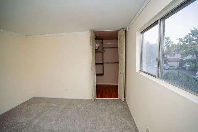 a view of front door with wooden floor