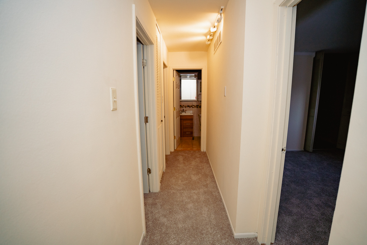 1221 Cedarwood Drive, Unit F Crest Hill, IL 60403 - Photo 6 of 35 a view of a hallway with wooden floor