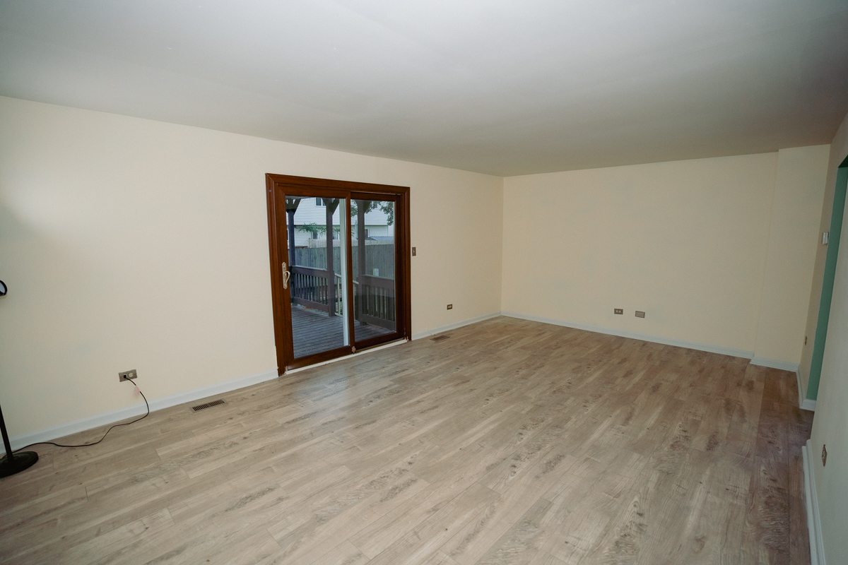 1221 Cedarwood Drive, Unit F Crest Hill, IL 60403 - Photo 9 of 35 wooden floor in a room