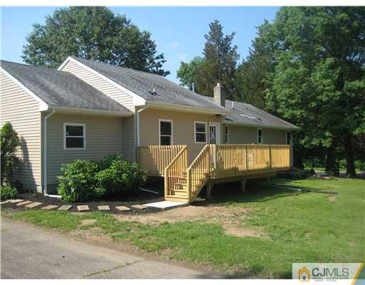 211 Lambertson Road Old Bridge, NJ 07747 - Photo 16 of 19 a view of a house with a yard