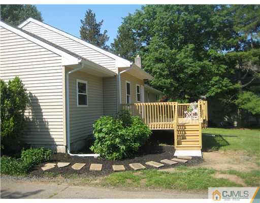 211 Lambertson Road Old Bridge, NJ 07747 - Photo 17 of 19 a view of a house with a yard
