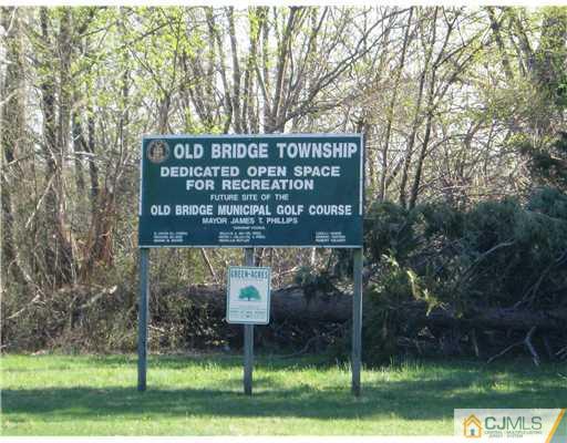 211 Lambertson Road Old Bridge, NJ 07747 - Photo 19 of 19 a sign on the side of a tree